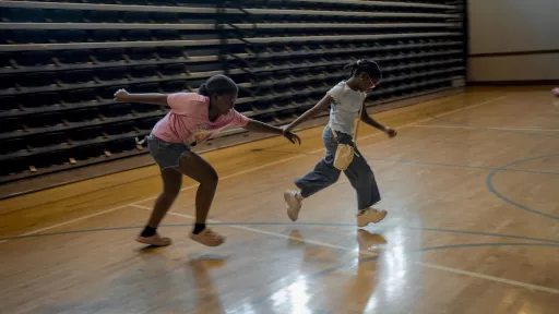 Marie Raphaelle plays with other children during the Back-to-School event at Holy Trinity