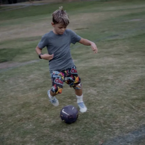 A boy playing soccer