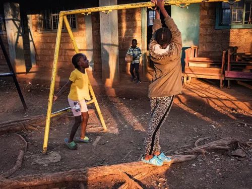 Children play outside Inuka&rsquo;s entrance