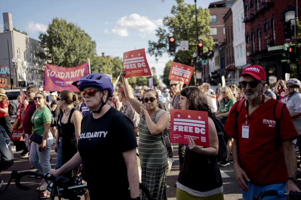 Protesters march from Dupont Circle to Logan Circle, Washington