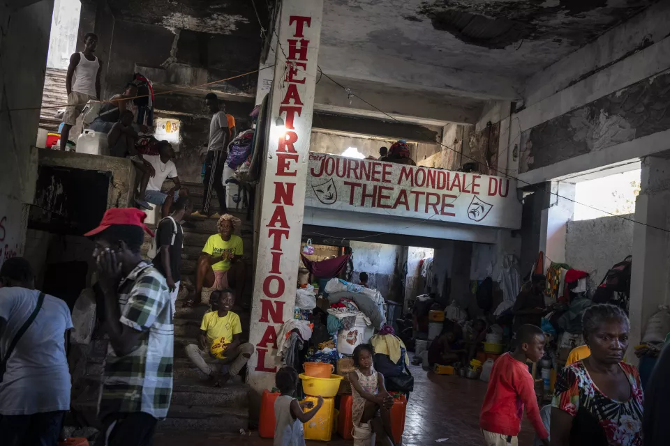 Crowded interior of concrete building